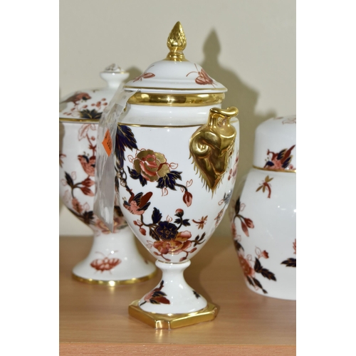 375 - A GROUP OF COALPORT 'HONG KONG' PATTERN GINGER JARS AND URNS, comprising two covered urns with gilt ... 