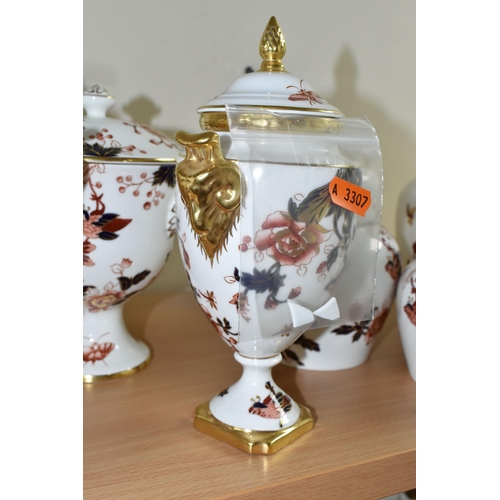 375 - A GROUP OF COALPORT 'HONG KONG' PATTERN GINGER JARS AND URNS, comprising two covered urns with gilt ... 