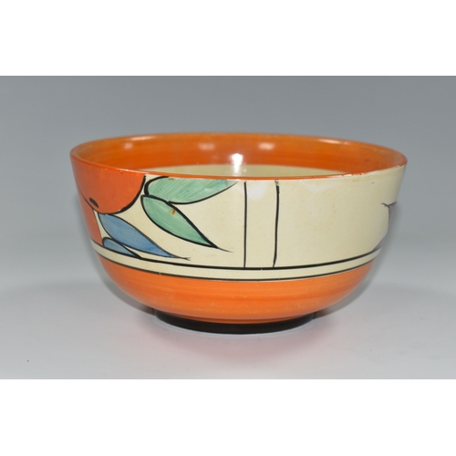 379 - A NEWPORT POTTERY BOWL HANDPAINTED WITH A DESIGN OF ORANGES, orange band to inner rim, black printed... 