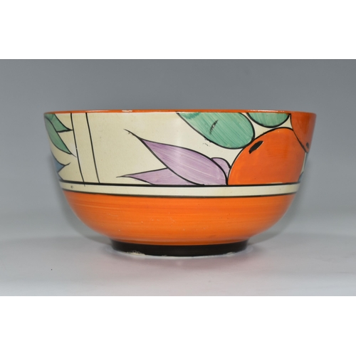 379 - A NEWPORT POTTERY BOWL HANDPAINTED WITH A DESIGN OF ORANGES, orange band to inner rim, black printed... 