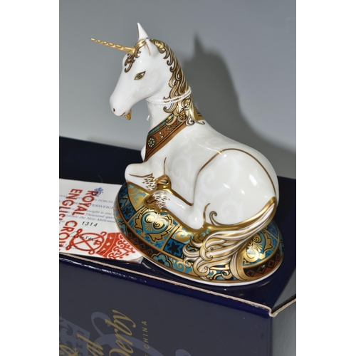 381 - A BOXED ROYAL CROWN DERBY LIMITED EDITION 'UNICORN' PAPERWEIGHT, designed to celebrate the New Mille... 