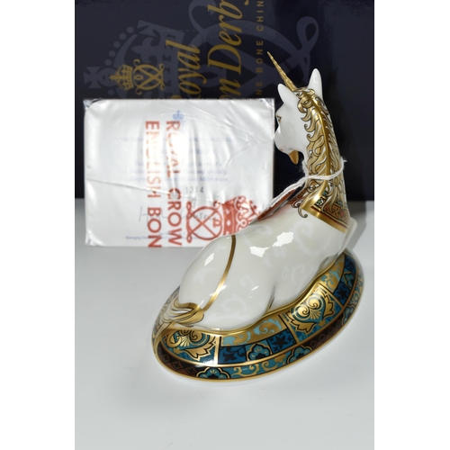 381 - A BOXED ROYAL CROWN DERBY LIMITED EDITION 'UNICORN' PAPERWEIGHT, designed to celebrate the New Mille... 