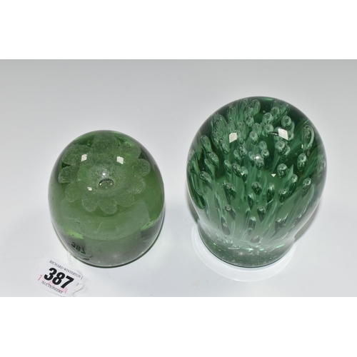 387 - TWO VICTORIAN GREEN GLASS DUMP WEIGHTS, the larger with controlled bubble inclusions, height 12cm, c... 