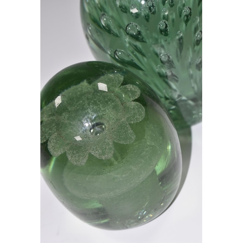 387 - TWO VICTORIAN GREEN GLASS DUMP WEIGHTS, the larger with controlled bubble inclusions, height 12cm, c... 