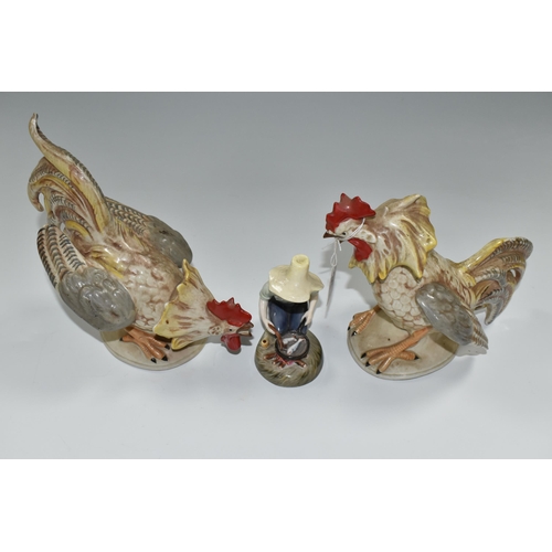 391 - TWO 20TH CENTURY CONTINENTAL PORCELAIN FIGURES OF COCKERELS, posed as ready to fight each other, mod... 