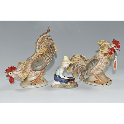 391 - TWO 20TH CENTURY CONTINENTAL PORCELAIN FIGURES OF COCKERELS, posed as ready to fight each other, mod... 