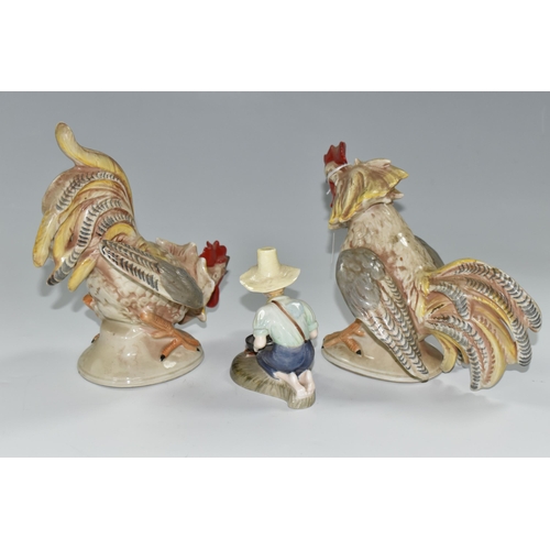 391 - TWO 20TH CENTURY CONTINENTAL PORCELAIN FIGURES OF COCKERELS, posed as ready to fight each other, mod... 