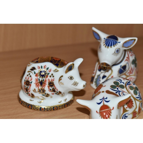 394 - THREE ROYAL CROWN DERBY PIGLET PAPERWEIGHTS, comprising Piglet introduced 1996-1999, silver stopper,... 