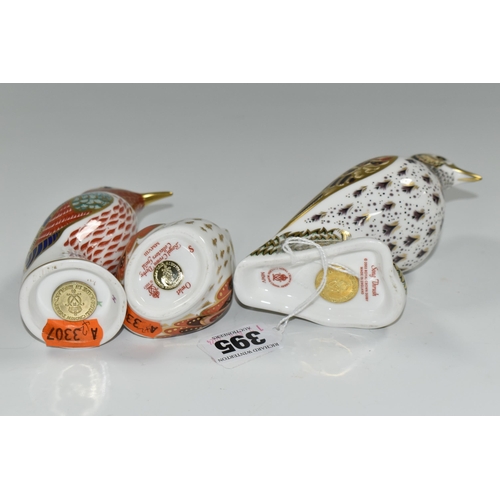 395 - THREE ROYAL CROWN DERBY BIRD PAPERWEIGHTS, comprising 'Song Thrush', gold stopper, a Collectors Guil... 