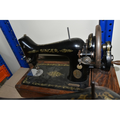 417 - A LARGE ORNATE CAST IRON BOOT SCRAPER AND TWO SINGER SEWING MACHINES, comprising a Victorian cast ir... 