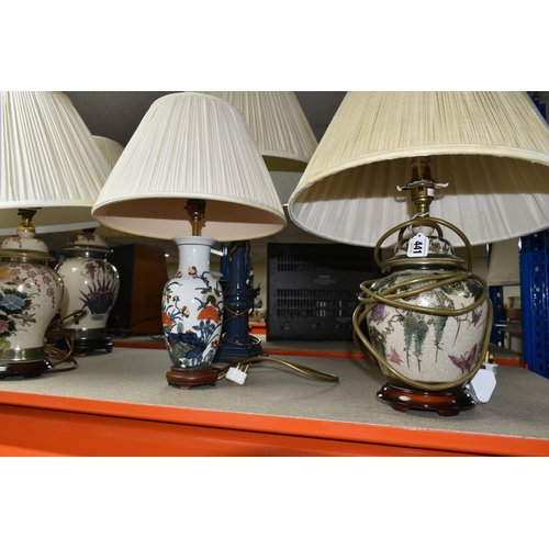 441 - A GROUP OF TABLE LAMPS, comprising nine lamps, mainly ceramic and oriental in style, including three... 