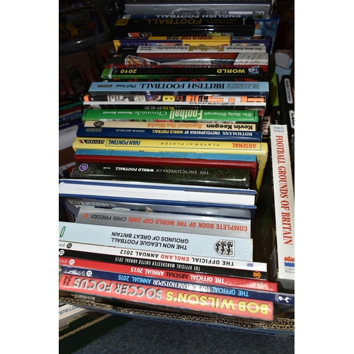 447 - FOUR BOXES OF FOOTBALL INTEREST HARDBACK AND PAPERBACK BOOKS, approximately one hundred and twenty t... 