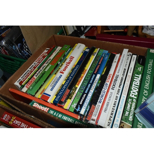 447 - FOUR BOXES OF FOOTBALL INTEREST HARDBACK AND PAPERBACK BOOKS, approximately one hundred and twenty t... 