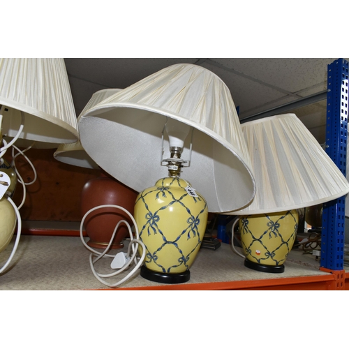 448 - A GROUP OF TABLE LAMPS, comprising fourteen lamps, in different styles with shades, including three ... 