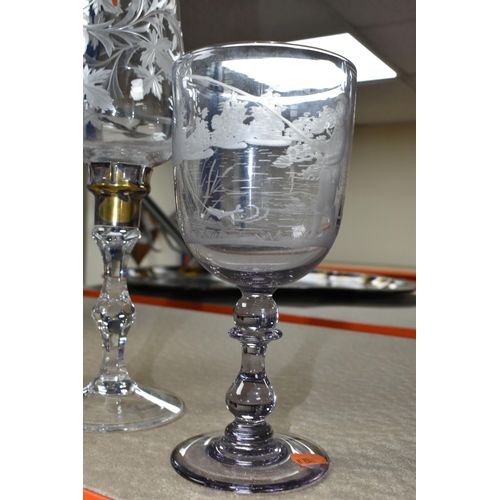 496 - THREE PIECES OF ENGRAVED GLASS WARE, comprising a clear glass candle lantern with foliate decoration... 