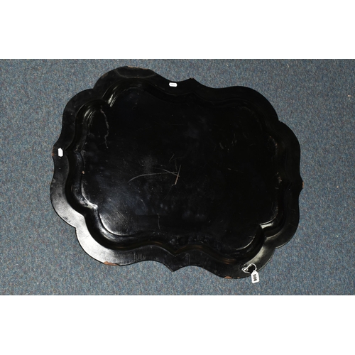 506 - A LARGE VICTORIAN BLACK LACQUERED PAPIER MACHE TRAY, with gilt foliate border decoration, width 80.5... 