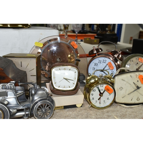 507 - A COLLECTION OF SMALL CLOCKS, nineteen alarm, mantel, carriage, anniversary and desk clocks, mainly ... 