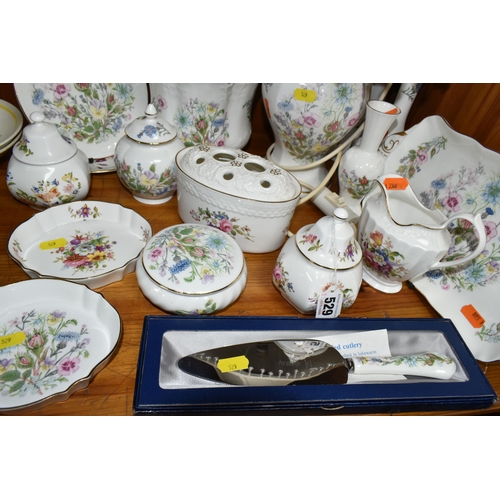 529 - A SELECTION OF DECORATIVE AYNSLEY CHINA, to include a table lamp, planter, three covered storage jar... 