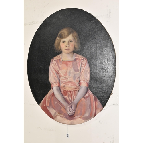 559 - AN EARLY 20TH CENTURY PORTRAIT OF A YOUNG GIRL, the portrait depicts a seated girl wearing a pink si... 