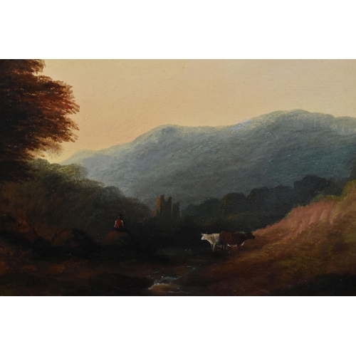 560 - A 19TH CENTURY ENGLISH SCHOOL LANDSCAPE, cattle and a cowherd are beside a river with a ruined castl... 