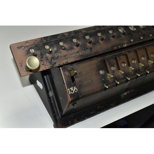 564 - A T.I.M. MECHANICAL CALCULATING MACHINE, black casing in worn condition with paint loss, surface rus... 