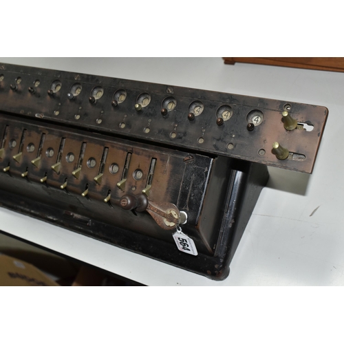 564 - A T.I.M. MECHANICAL CALCULATING MACHINE, black casing in worn condition with paint loss, surface rus... 