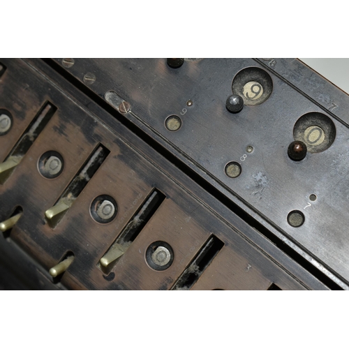 564 - A T.I.M. MECHANICAL CALCULATING MACHINE, black casing in worn condition with paint loss, surface rus... 