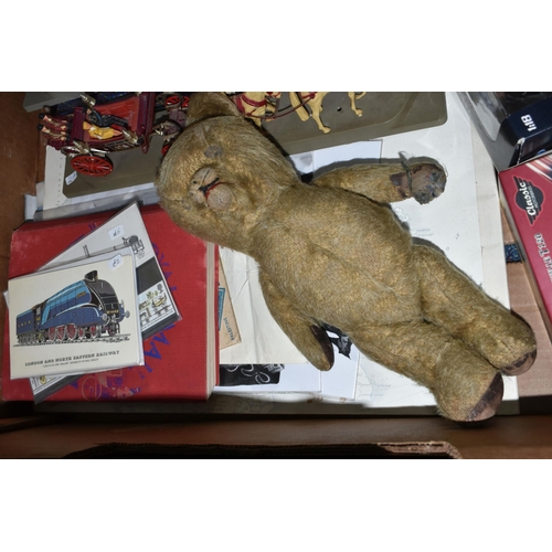 582 - A BOX OF TOYS AND EPHEMERA ETC, to include a vintage teddy bear in distressed condition, boxed die c... 