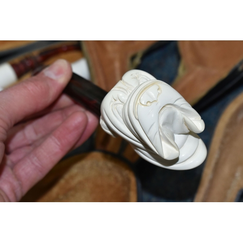 587 - A BOX OF CASED REPRODUCTION MEERSCHAUM PIPES, comprising cased pipes in the forms of a mastiff type ... 