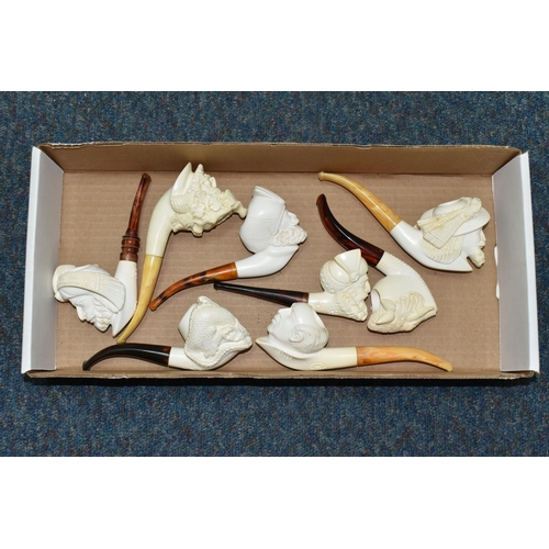 588 - A BOX OF REPRODUCTION MEERSCHAUM PIPES, comprising eight pipes: five carved with different male face... 