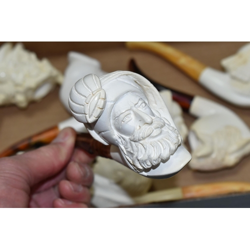 588 - A BOX OF REPRODUCTION MEERSCHAUM PIPES, comprising eight pipes: five carved with different male face... 