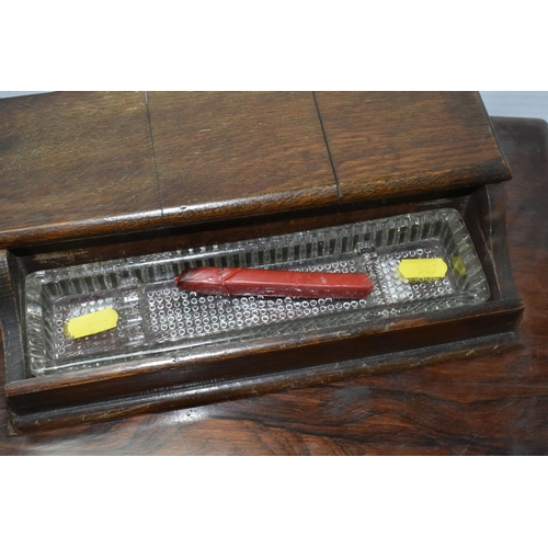 589 - A WRITING SLOPE AND DESK STAND, comprising a writing slope with mother of pearl cartouche and escutc... 