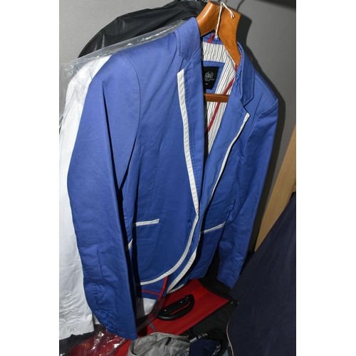 606 - A COLLECTION OF MEN'S CLOTHING AND LUGGAGE, comprising two graduated red 'Constellation' suitcases, ... 