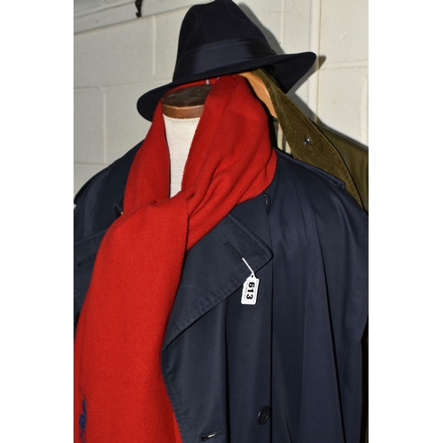 613 - A NAVY BLUE BURBERRY RAINCOAT AND A BURBERRYS WAX JACKET, comprising raincoat size 48 Regular,  a gr... 