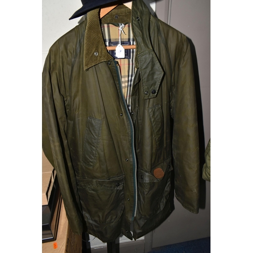 613 - A NAVY BLUE BURBERRY RAINCOAT AND A BURBERRYS WAX JACKET, comprising raincoat size 48 Regular,  a gr... 