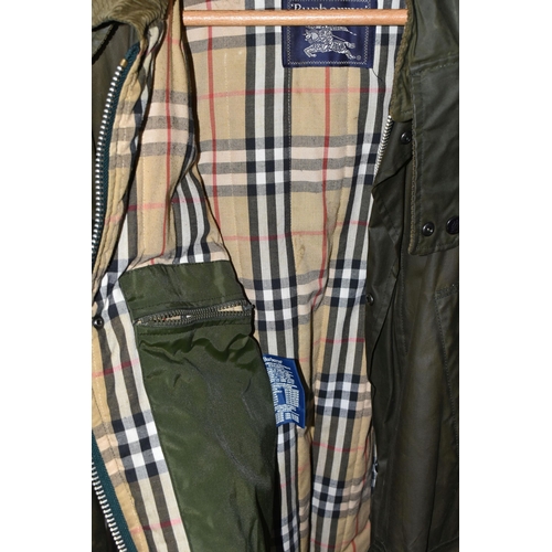 613 - A NAVY BLUE BURBERRY RAINCOAT AND A BURBERRYS WAX JACKET, comprising raincoat size 48 Regular,  a gr... 