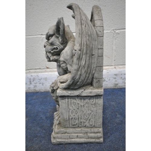 A MODERN COMPOSITE GROTESQUE, seated on a throne width 30cm x depth ...