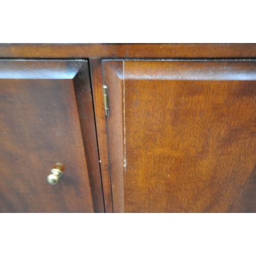 A G PLAN MAHOGANY EXTENDING DINING TABLE, with a single fold out leaf