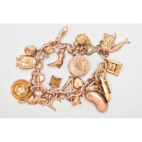 29 - A 9CT GOLD CHARM BRACELET, rose gold curb link bracelet, each link stamped 9.375, fitted with a late... 