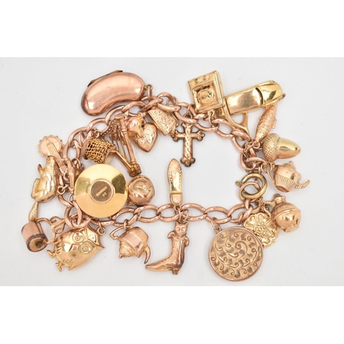 29 - A 9CT GOLD CHARM BRACELET, rose gold curb link bracelet, each link stamped 9.375, fitted with a late... 