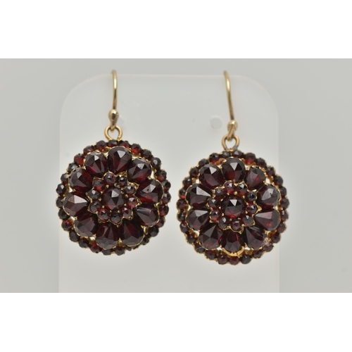 3 - A PAIR OF BOHEMIAN GARNET DROP EARRINGS, designed as three tiers of faceted garnets to the later add... 