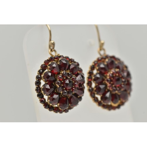 3 - A PAIR OF BOHEMIAN GARNET DROP EARRINGS, designed as three tiers of faceted garnets to the later add... 