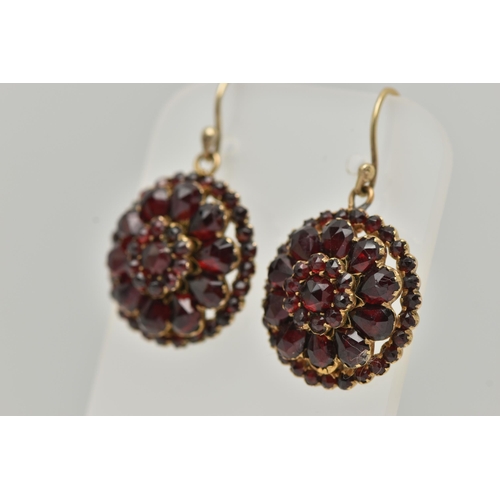 3 - A PAIR OF BOHEMIAN GARNET DROP EARRINGS, designed as three tiers of faceted garnets to the later add... 
