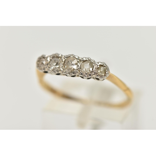 49 - A YELLOW AND WHITE METAL DIAMOND FIVE STONE RING, set with five graduated old cut diamonds, estimate... 