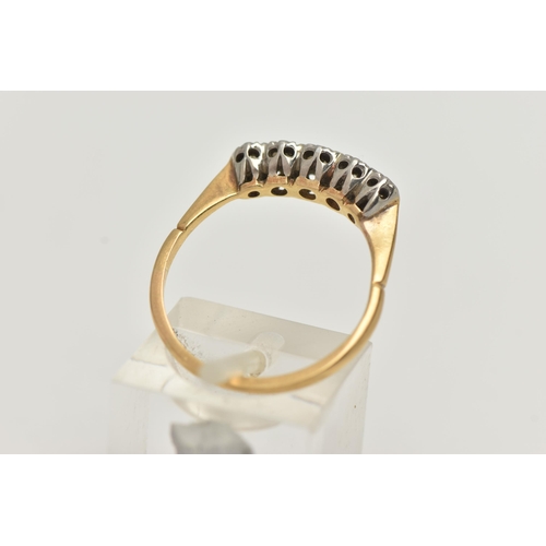 49 - A YELLOW AND WHITE METAL DIAMOND FIVE STONE RING, set with five graduated old cut diamonds, estimate... 