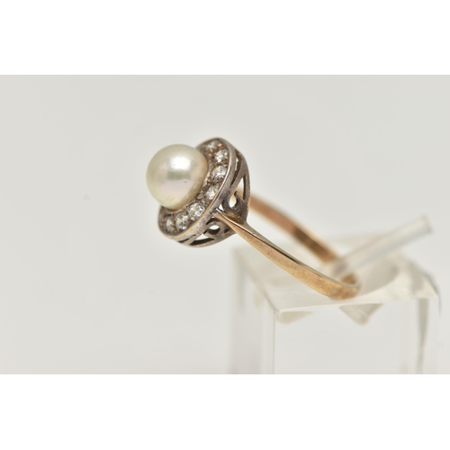 5 - A 9CT GOLD CLUSTER RING, designed as a central cultured pearl, within a circular cut cubic zirconia ... 