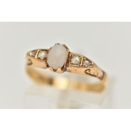 52 - A YELLOW METAL OPAL AND DIAMOND RING, set with a central oval cut opal cabochon (abraded), measuring... 