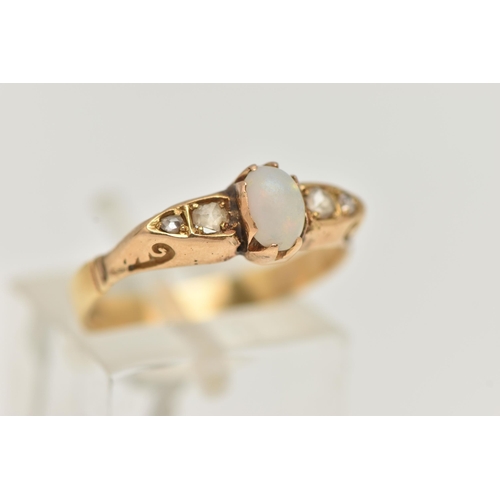 52 - A YELLOW METAL OPAL AND DIAMOND RING, set with a central oval cut opal cabochon (abraded), measuring... 