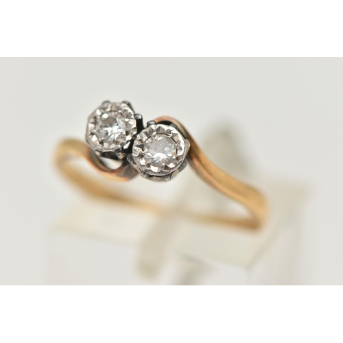 53 - AN 18CT GOLD DIAMOND TWO STONE RING, cross over ring, set with two round brilliant cut diamonds, eac... 