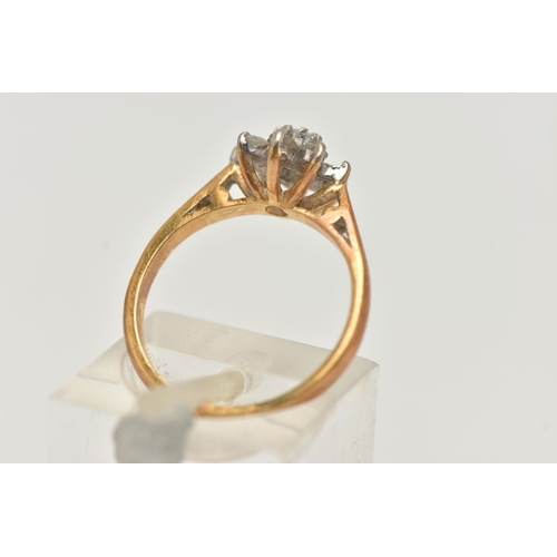 54 - AN 18CT GOLD DIAMOND CLUSTER RING, of a flower shape, set with eight round brilliant cut diamonds (o... 